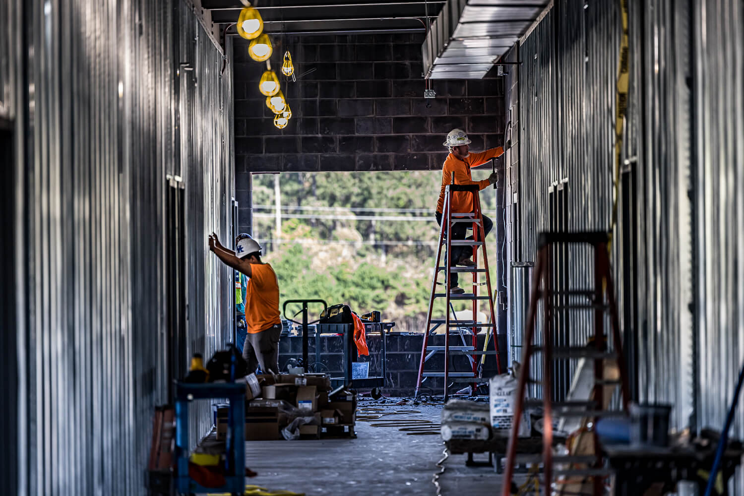 Two industrial workers at an unfinished industrial building in South Carolina.